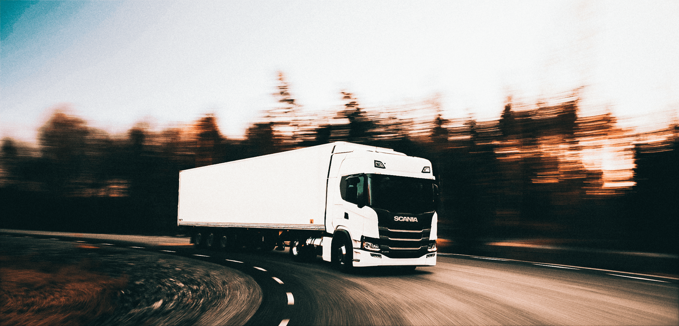 European truck on a motion-blurred road